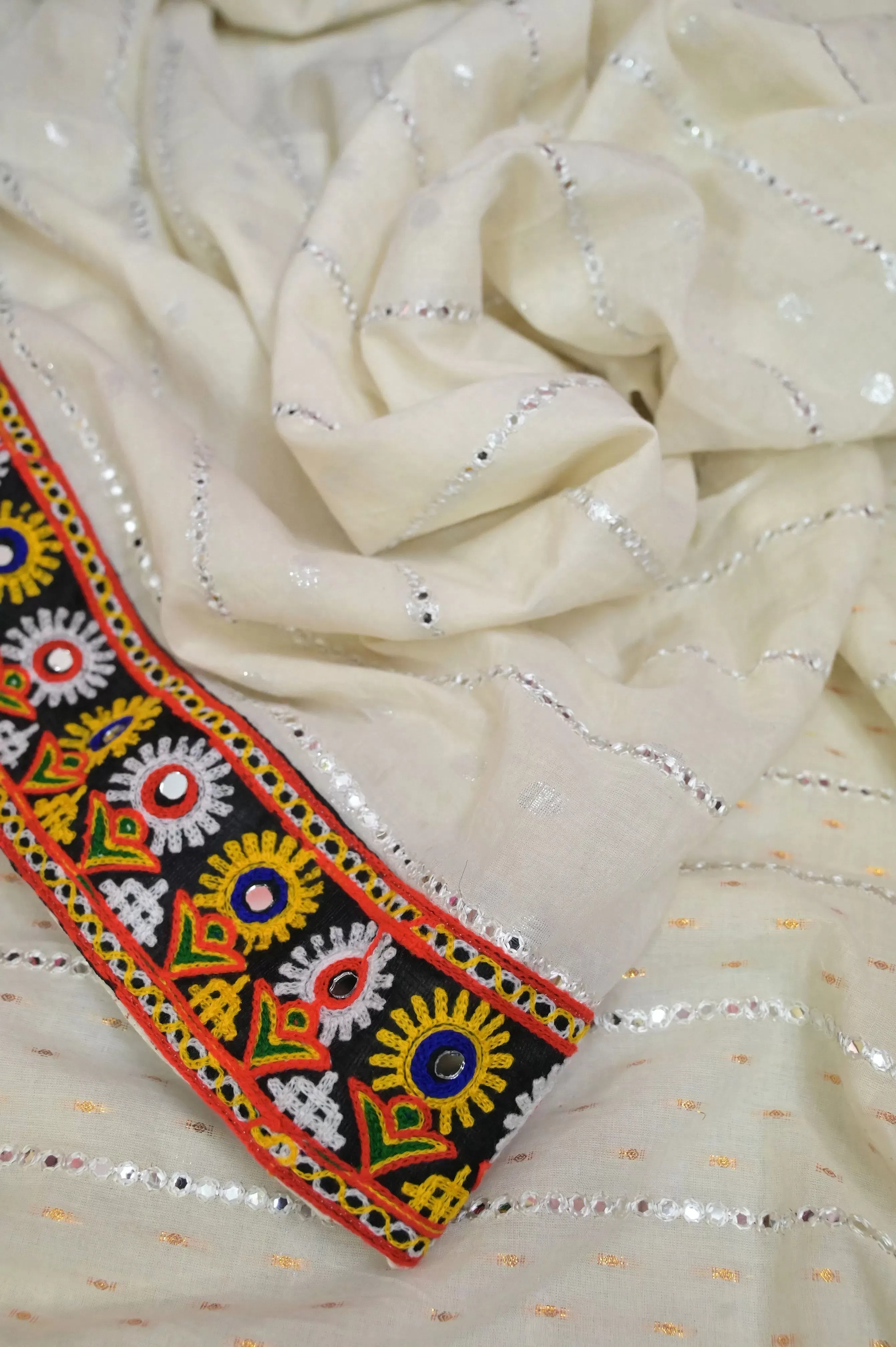 Offwhite Color Offwhite Color Cotton Chanderi Saree with Allover Mirror Embroidery and Kathiawadi Border