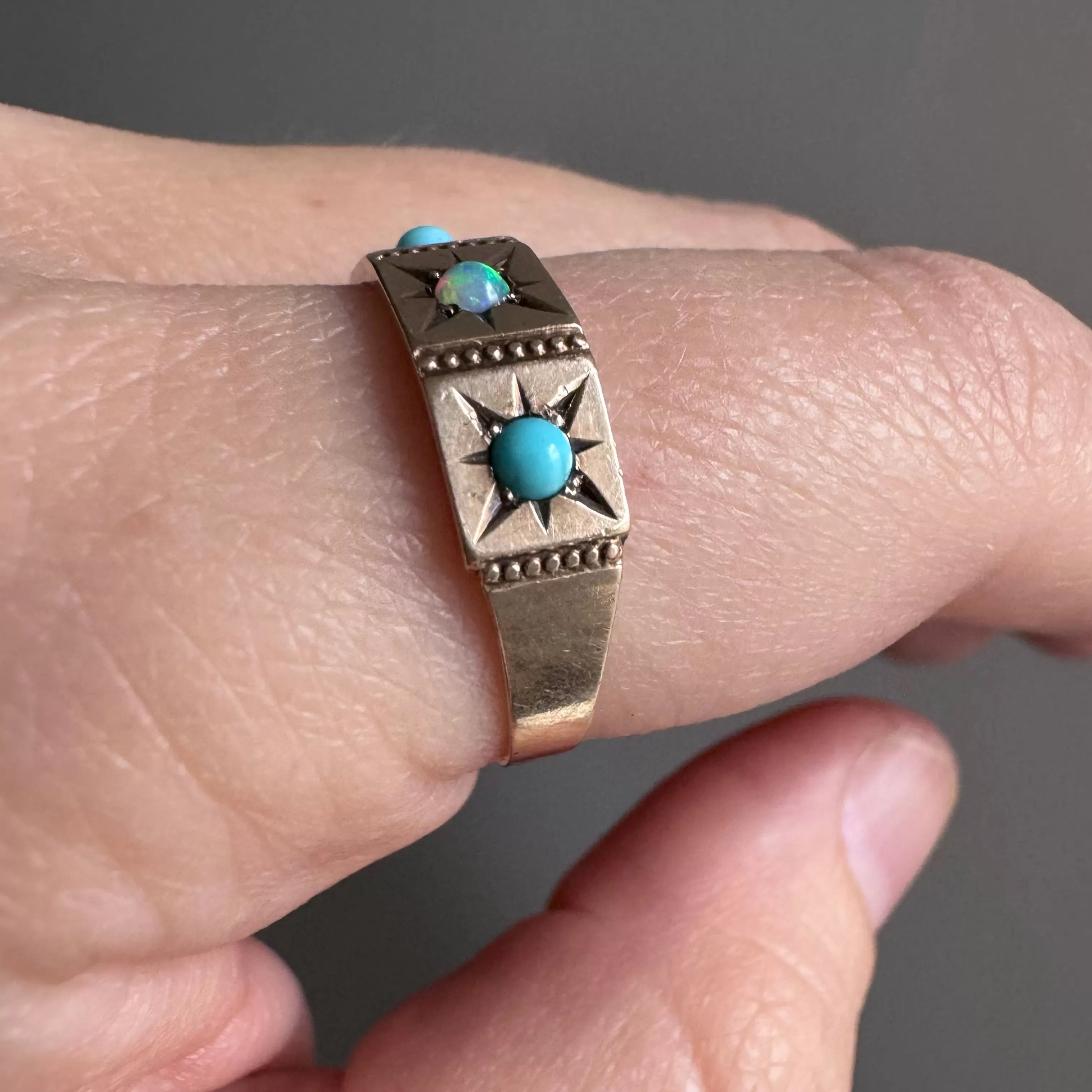 reimagined A N T I Q U E // 10k rosy yellow gold starburst trilogy band with opal and turquoise / size 7.75